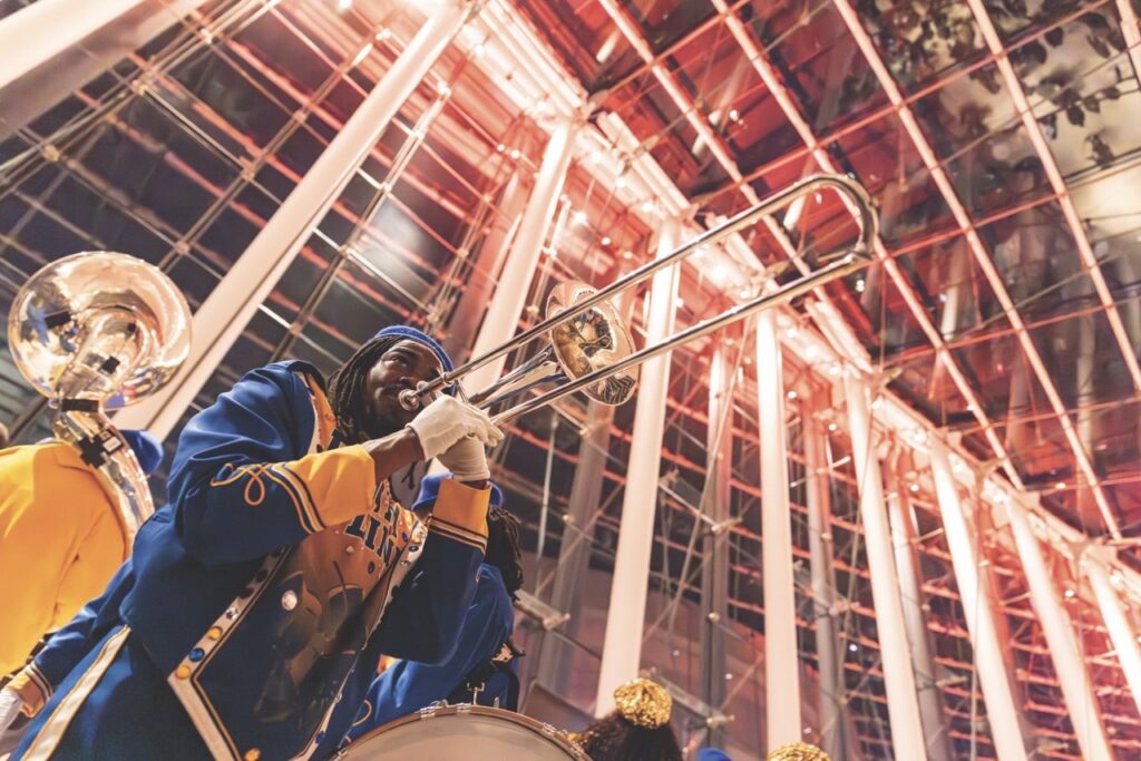 Trombone player performing at Kauffman Center for Performing Arts.