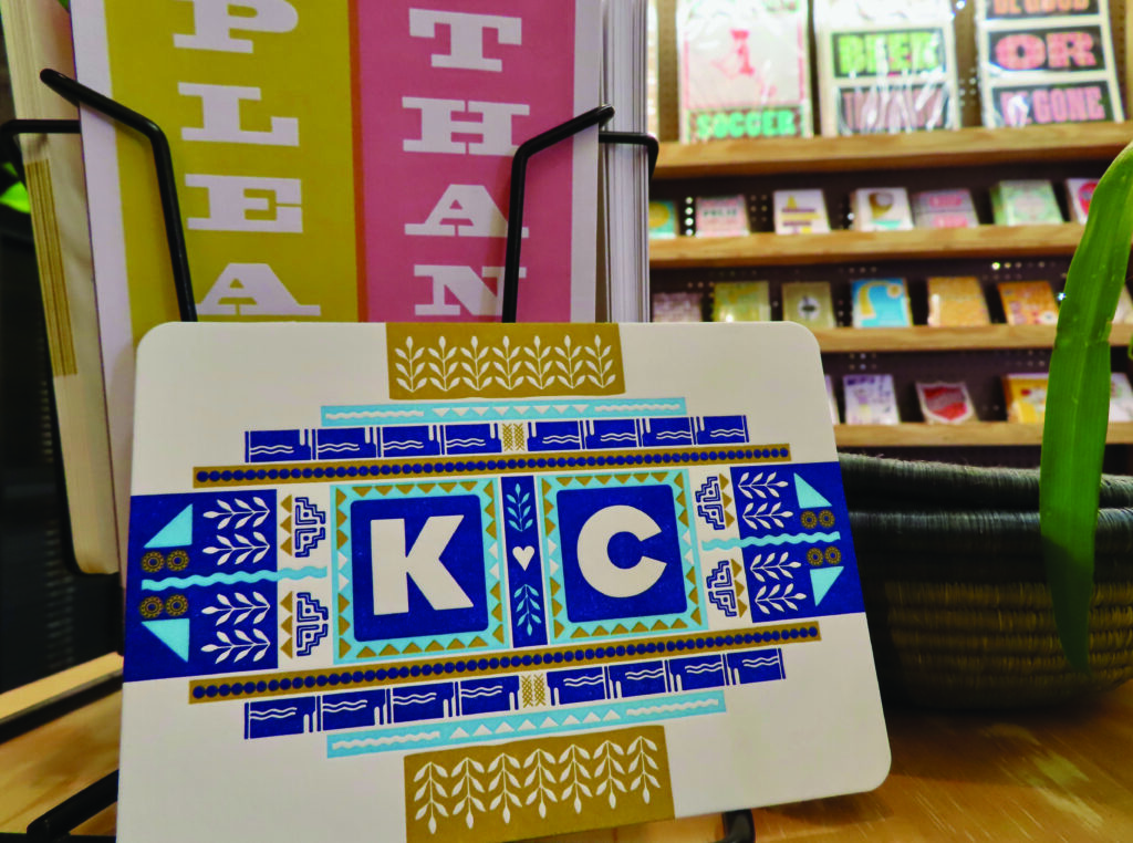 A "KC" card from Hammerpress. 