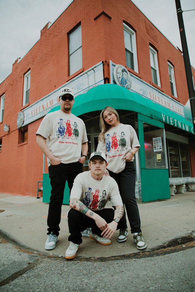 Three models sporting shirts from Made Mobb.