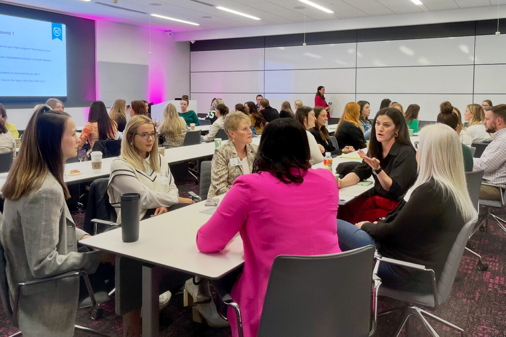 Attendees discussing talent topic at a TeamKC Roundtable
