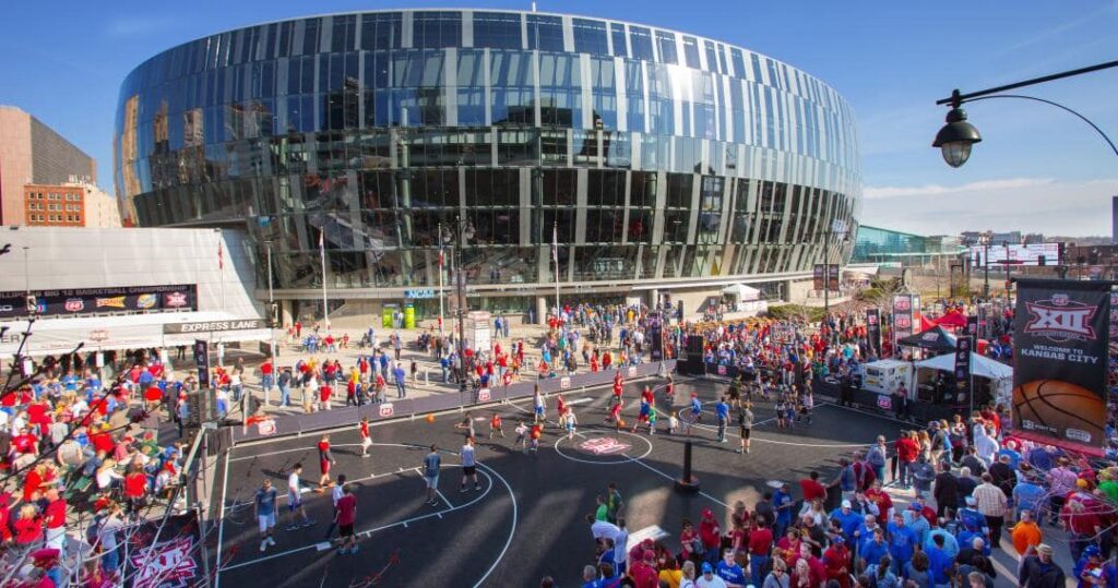 March Madness FanFest happening outside of T-Mobile Center, a large round mirror-glassed building