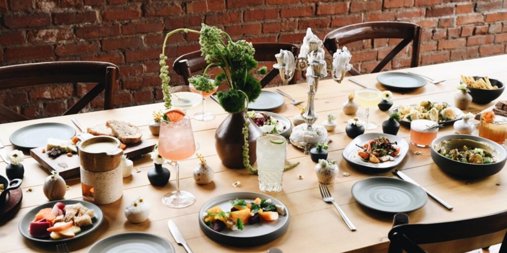 Rustic table setting with organic decorations and a variety of food