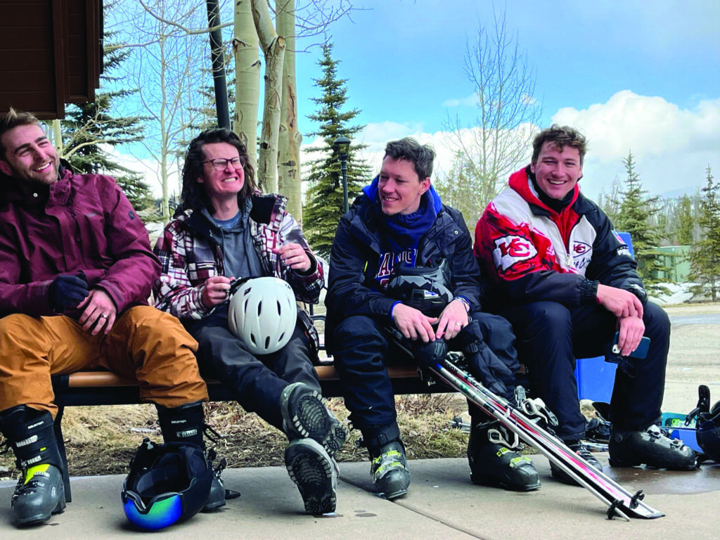 Jack with his friends on ski trip.