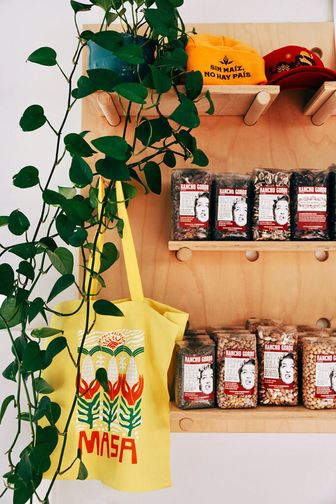 A shelf of beans on display at Yoli Tor
