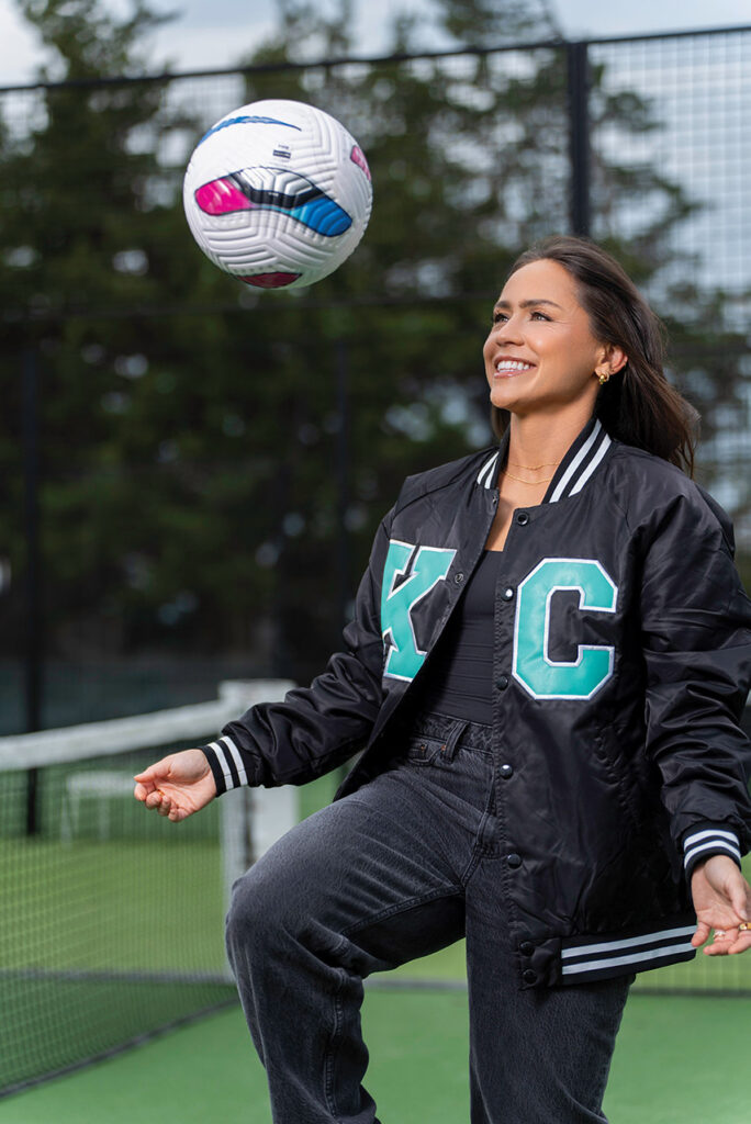 Lo'eau LaBonta bouncing a soccer ball on her knee