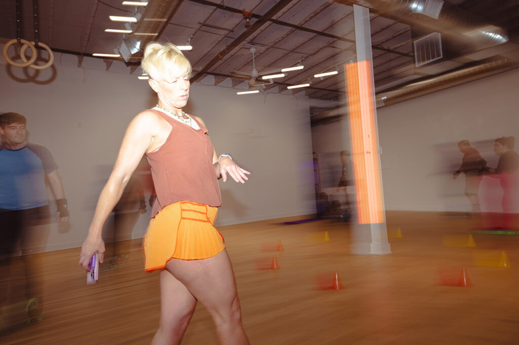 A class participant skating in studio.