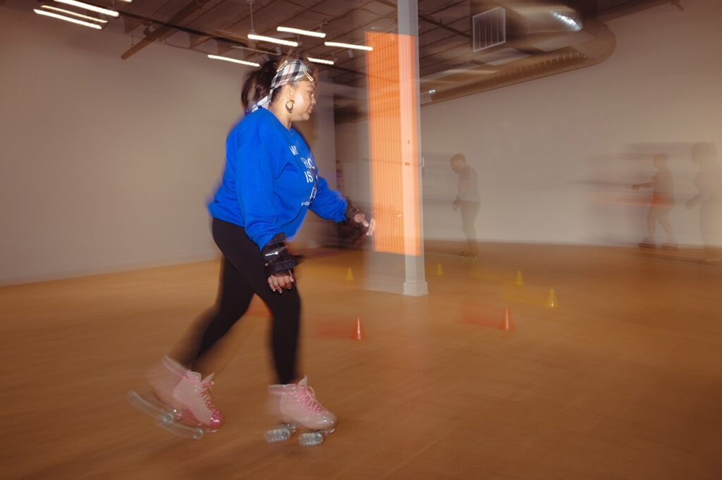 A class participant skating in studio.