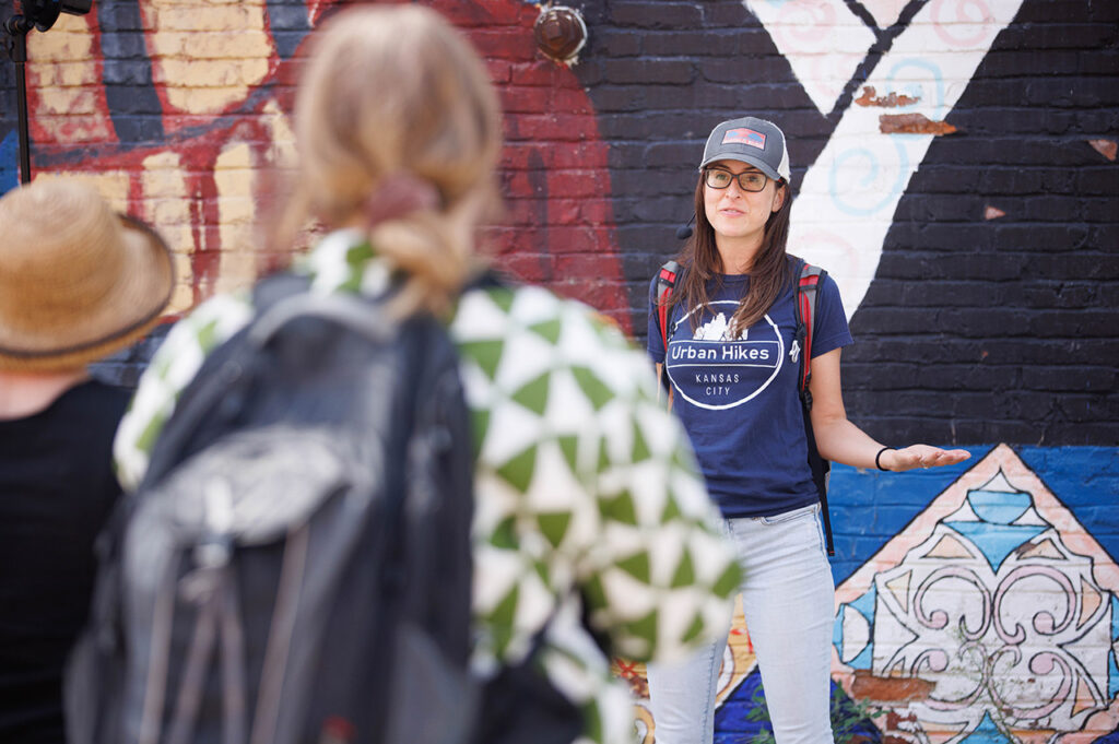 Lisa Pena giving a tour on an Urban Hike.