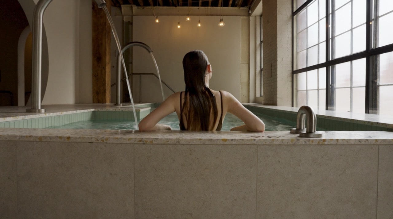 A woman in a spa pool at Kla Sanctuary.