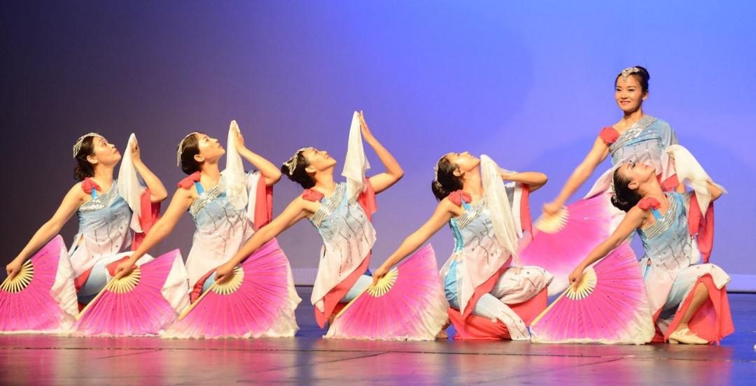 Vietnamese dancers perform on stage