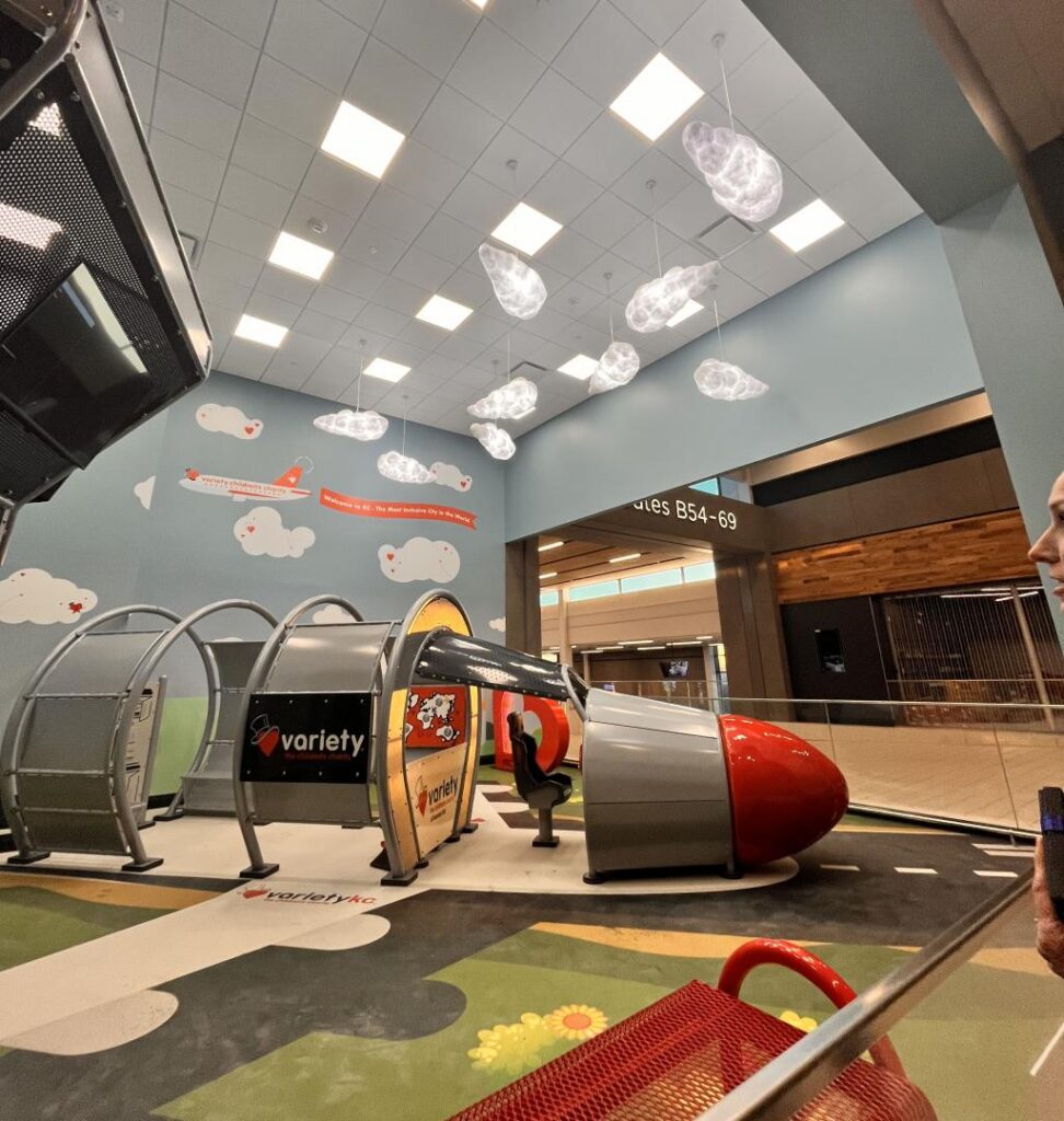 Airplane themed indoor playground with the Variety KC logo