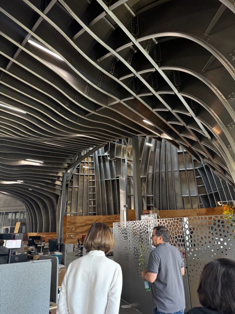 Large room with decorative metal ceiling designs