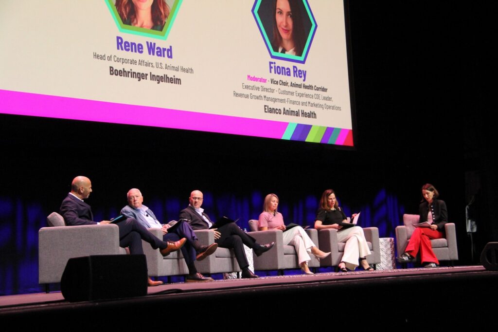 Panel speakers on stage at the KC Animal Health Summit